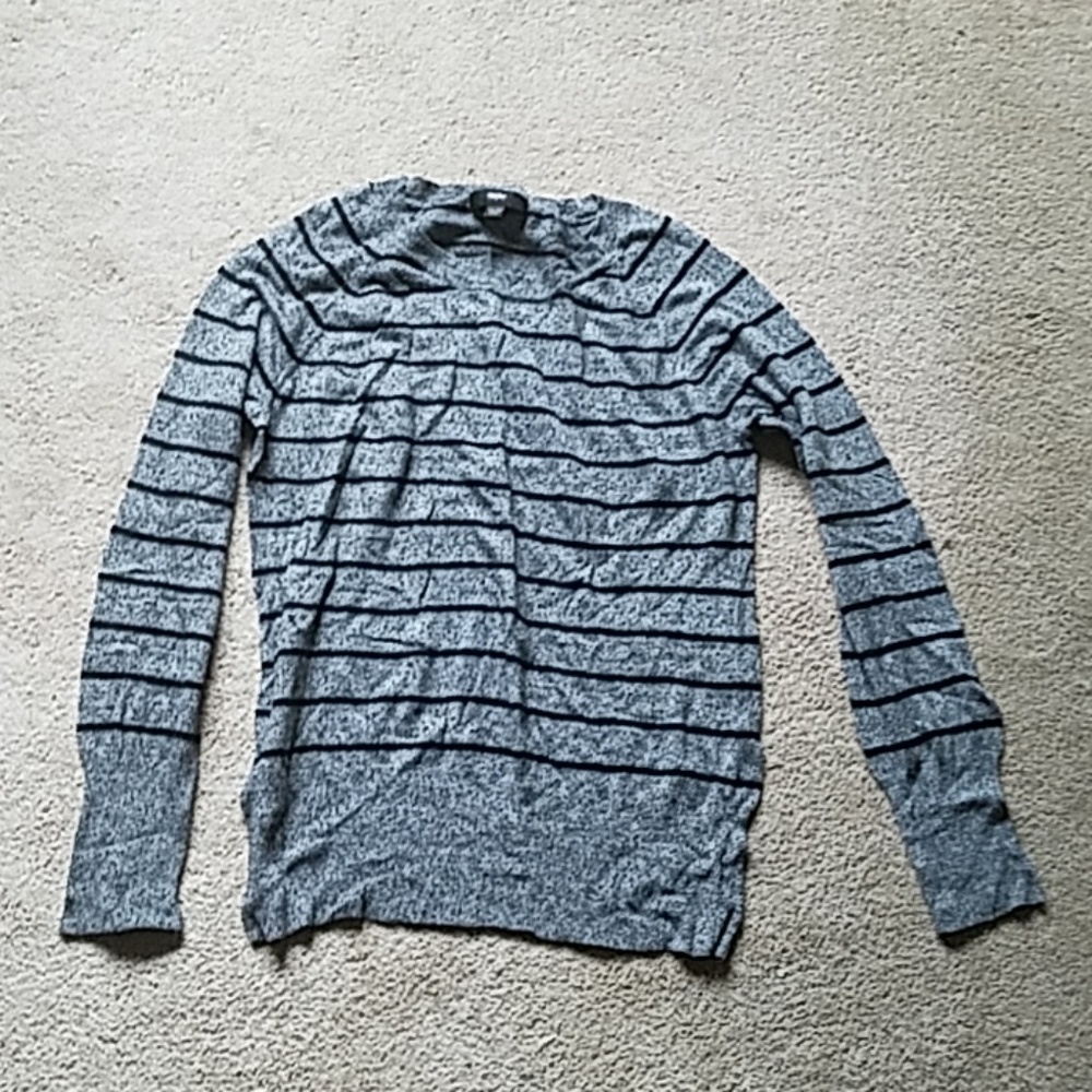 A gray and black thinner sweater